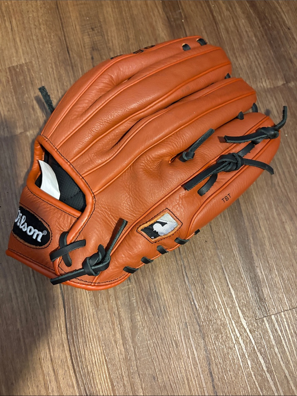 Wilson Orange Leather Baseball Glove with Black Lacing